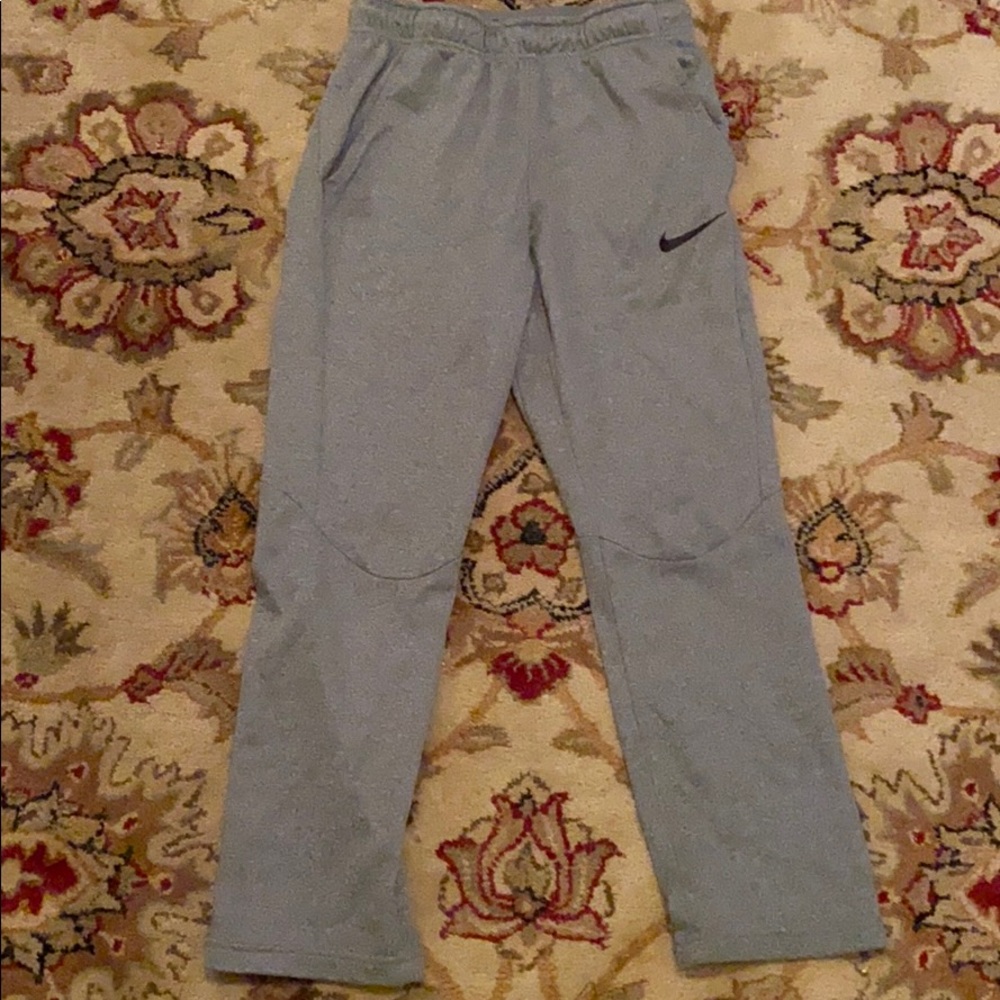 Grey Nike sweat pants.